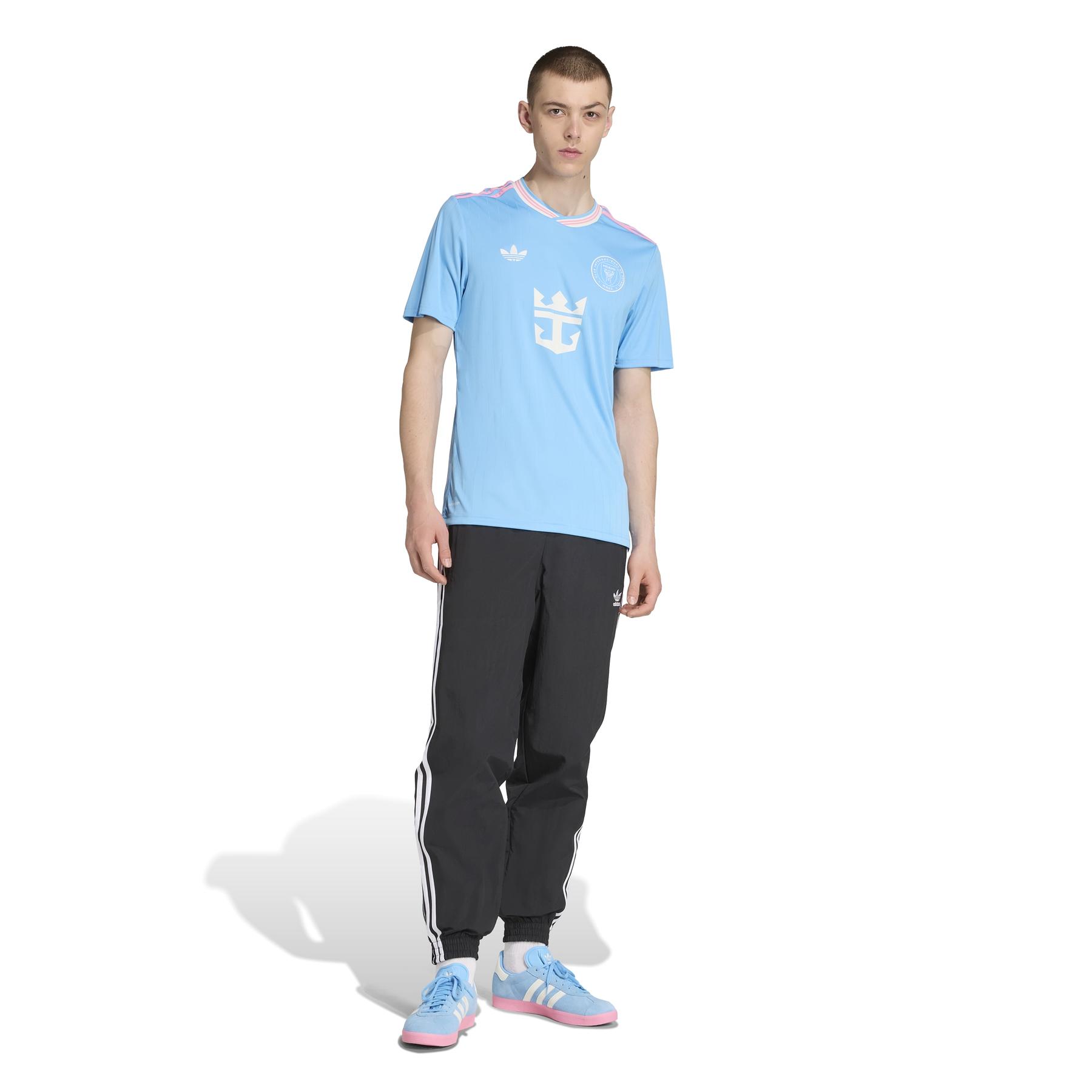 product/a/d/adidas_ka7504_6_apparel_on_model_walking_view_white.jpg